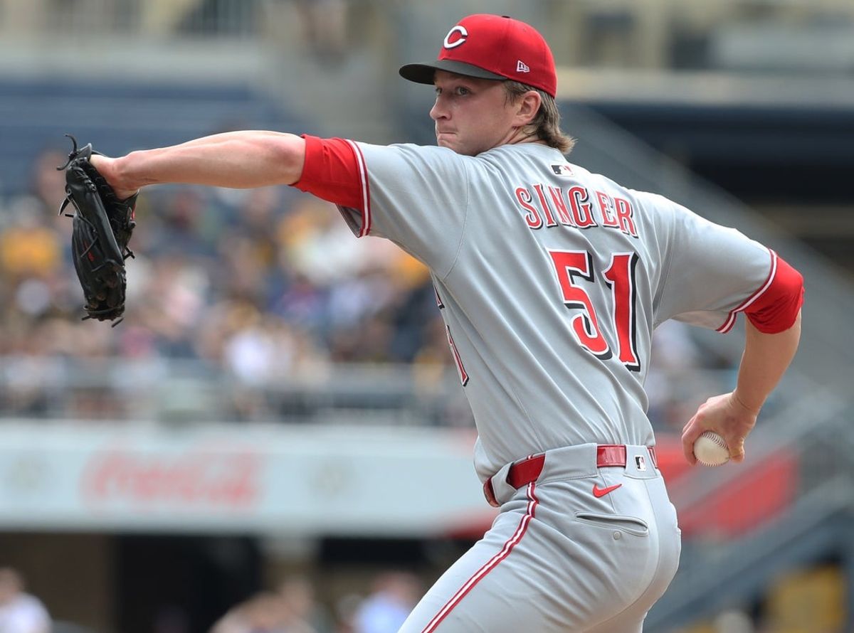 May 21, 2025; Pittsburgh, Pennsylvania, USA;  Cincinnati Reds starting  pitcher Brady Singer (51) delivers a pitch against the Pittsburgh Pirates during the first inning at PNC Park. Mandatory Credit: Charles LeClaire-Imagn Images