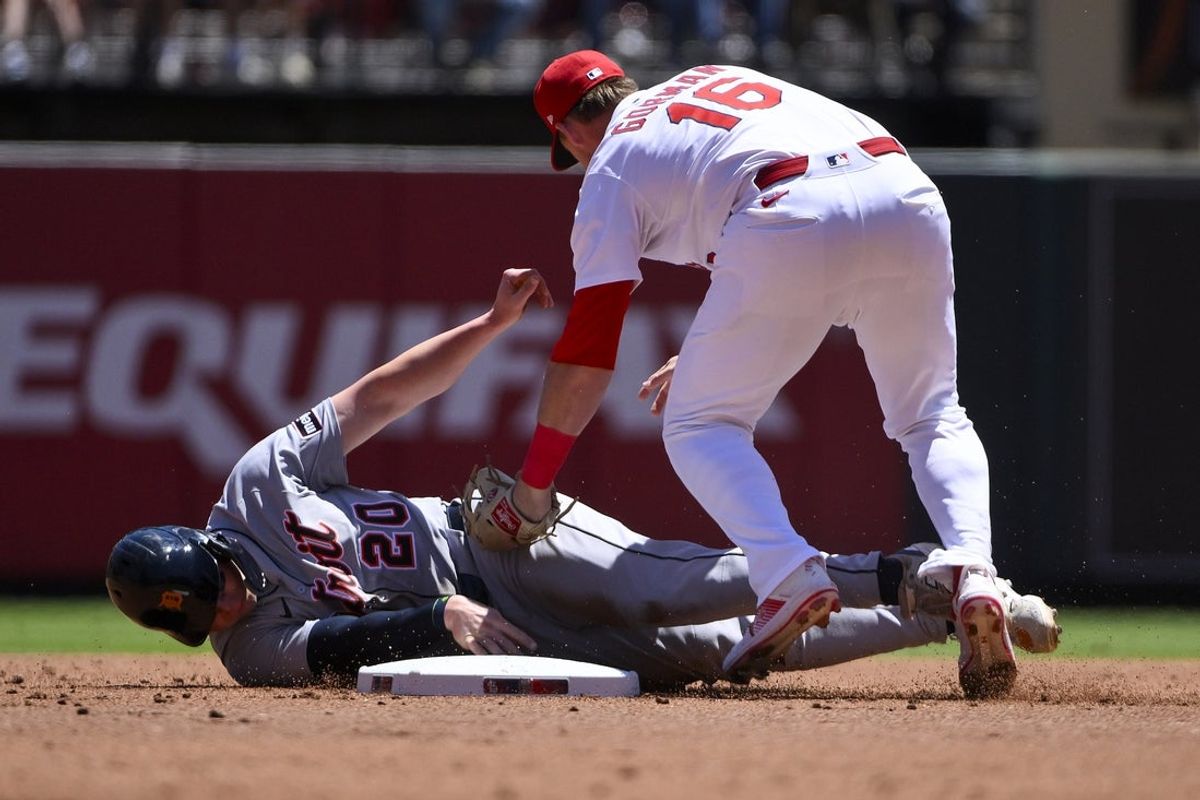 May 21, 2025; St. Louis, Missouri, USA;  St. Louis Cardinals second baseman Nolan Gorman (16) tags out Detroit Tigers first baseman Spencer Torkelson (20) during the second inning at Busch Stadium. Mandatory Credit: Jeff Curry-Imagn Images