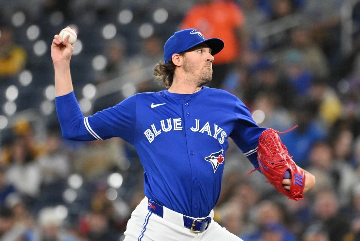May 21, 2025; Toronto, Ontario, CAN;  Toronto Blue Jays starting pitcher Kevin Gausman (34) delivers a pitch against the San Diego Padres in the first inning at Rogers Centre. Mandatory Credit: Dan Hamilton-Imagn Images