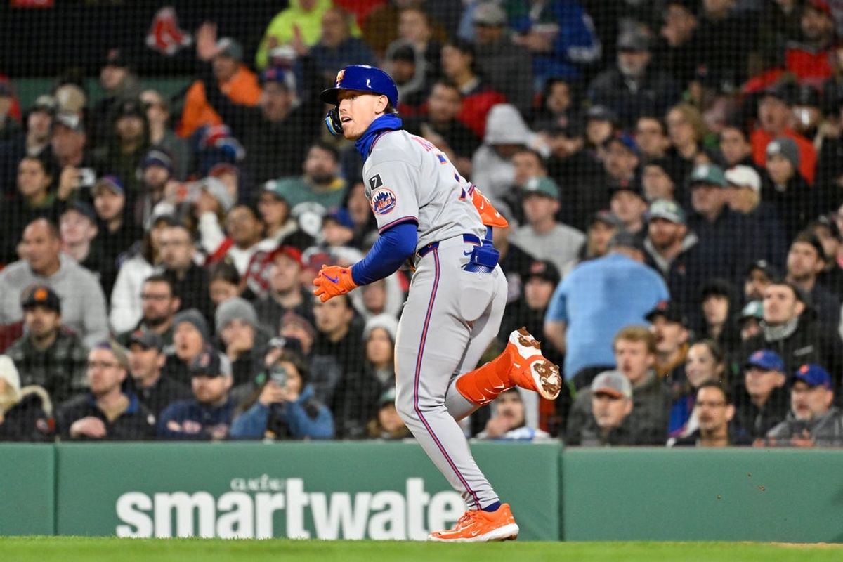 May 21, 2025; Boston, Massachusetts, USA; New York Mets third baseman Brett Baty (7) hits a two-RBI single during the seventh inning against the Boston Red Sox at Fenway Park. Mandatory Credit: Eric Canha-Imagn Images