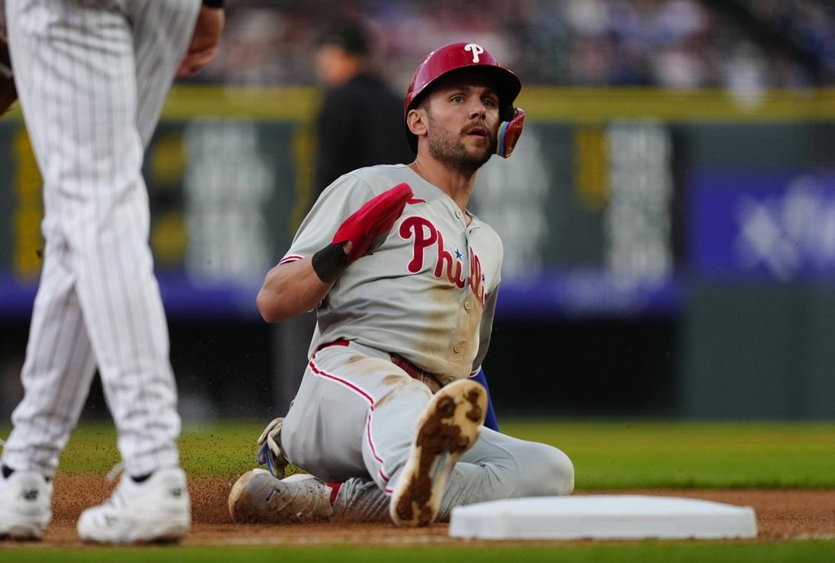 May 21, 2025; Denver, Colorado, USA; Philadelphia Phillies shortstop Trea Turner (7) advances to third in the fourth inning against the Colorado Rockies at Coors Field. Mandatory Credit: Ron Chenoy-Imagn Images