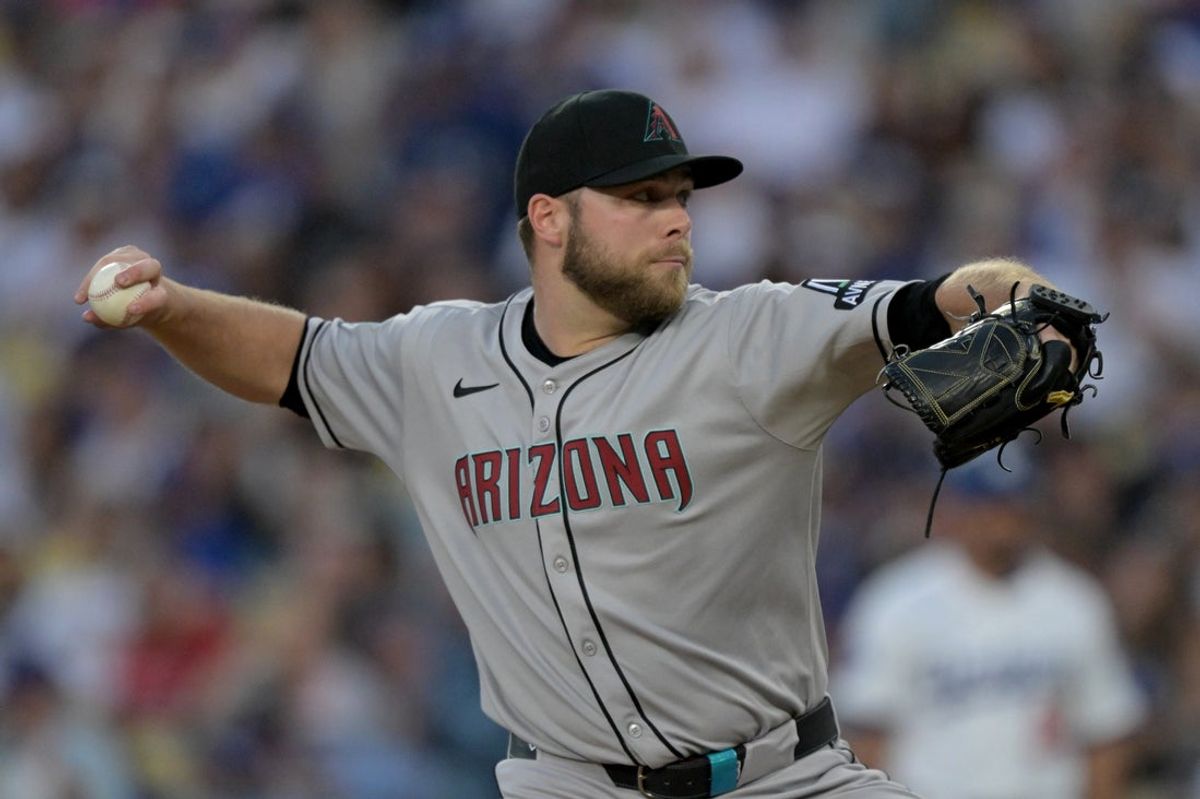 May 21, 2025; Los Angeles, California, USA; Arizona Diamondbacks pitcher Corbin Burnes (39) throws during the second inning against the Los Angeles Dodgers at Dodger Stadium. Mandatory Credit: Jayne Kamin-Oncea-Imagn Images