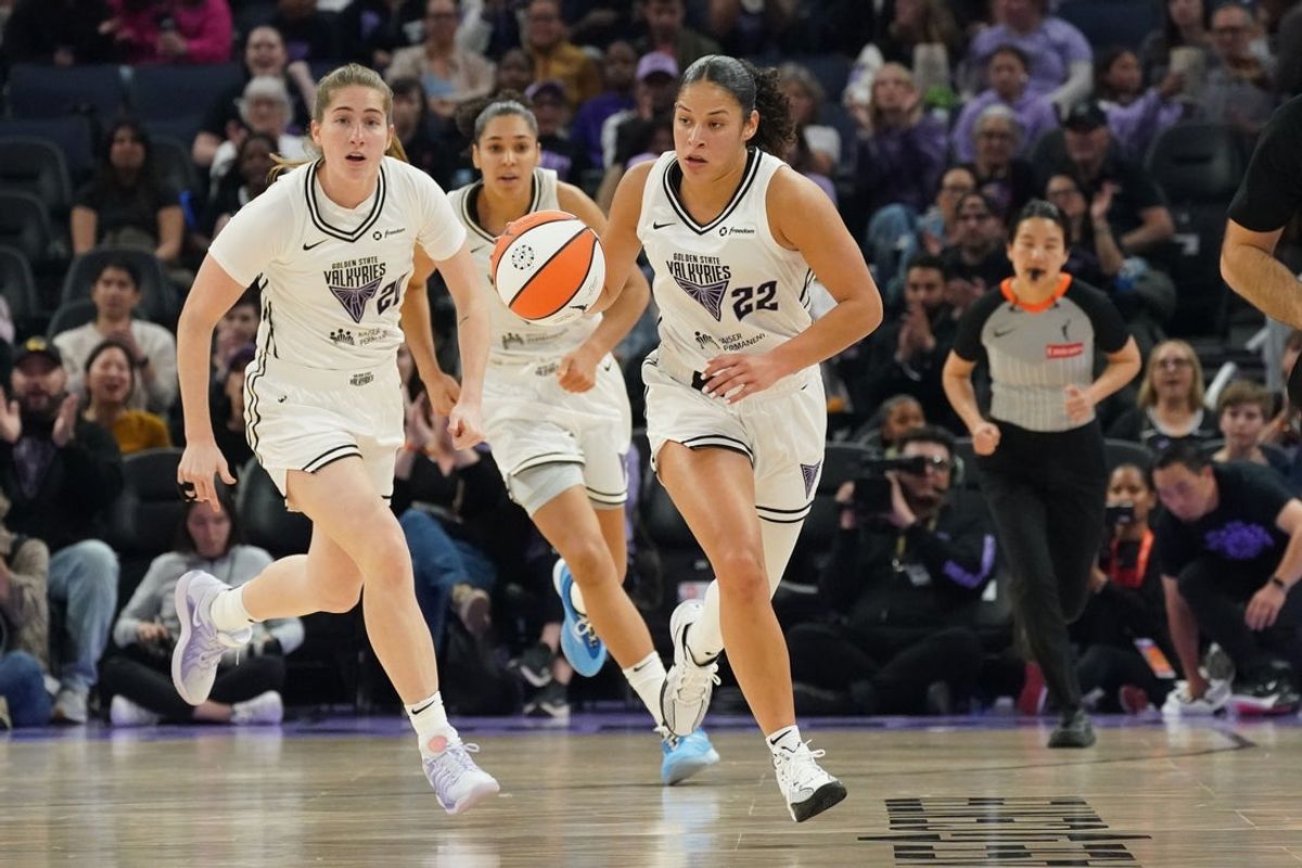 May 21, 2025; San Francisco, California, USA;  Golden State Valkyries guard Veronica Burton (22) dribbles up court with guard Kate Martin (20) during a game against Washington Mystics in the first quarter at Chase Center. Mandatory Credit: David Gonzales-Imagn Images