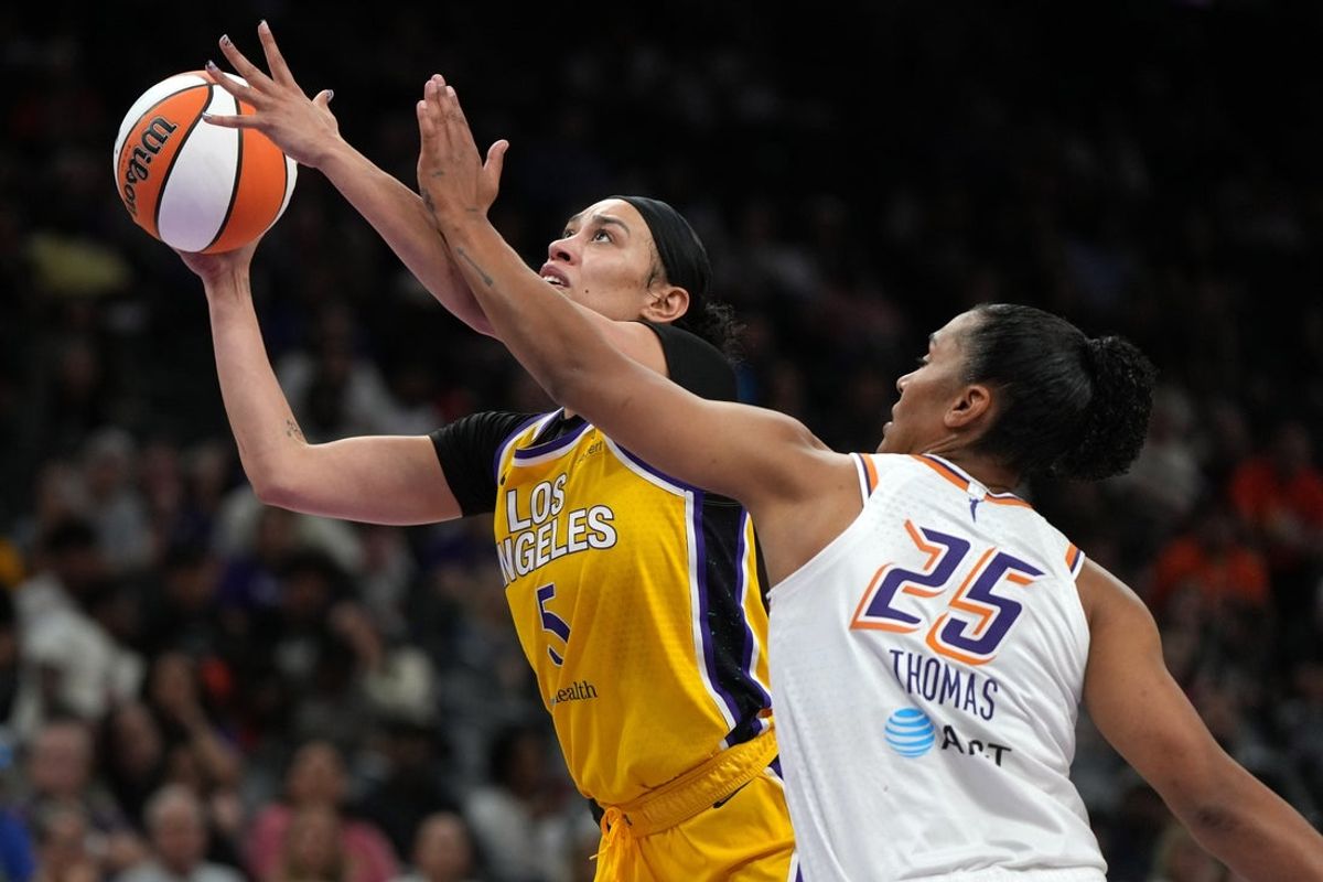 May 21, 2025; Phoenix, Arizona, USA; Los Angeles Sparks forward Dearica Hamby (5) shoots over Phoenix Mercury forward Alyssa Thomas (25) in the first half at Footprint Center. Mandatory Credit: Rick Scuteri-Imagn Images