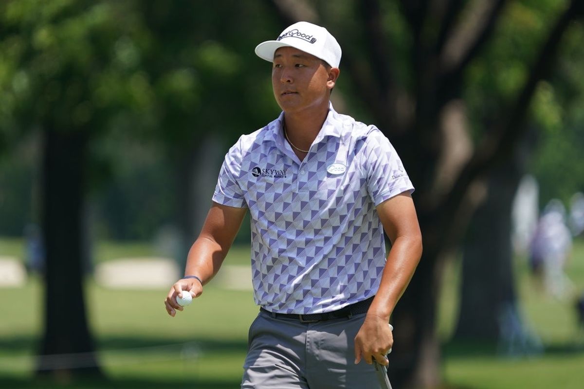 May 22, 2025; Fort Worth, Texas, USA; John Pak reacts after making a par on the sixth hole during the first round of the Charles Schwab Challenge golf tournament. Mandatory Credit: Raymond Carlin III-Imagn Images