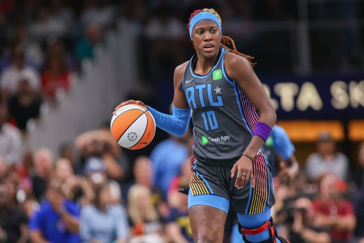 May 22, 2025; Atlanta, Georgia, USA; Atlanta Dream guard Rhyne Howard (10) dribbles against the Indiana Fever in the first half at State Farm Arena. Mandatory Credit: Brett Davis-Imagn Images
