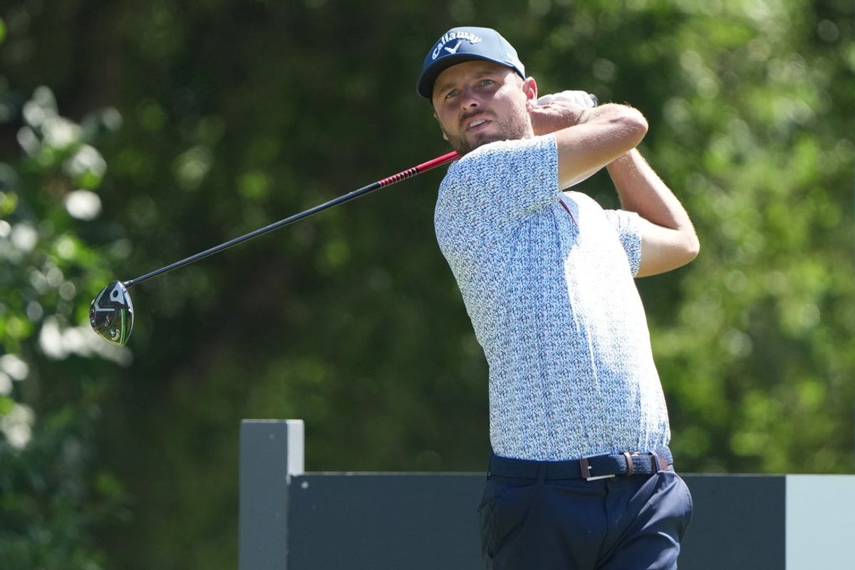 May 23, 2025; Fort Worth, Texas, USA; Adam Svensson plays his shot from the 12th tee during the second round of the Charles Schwab Challenge golf tournament. Mandatory Credit: Jim Cowsert-Imagn Images