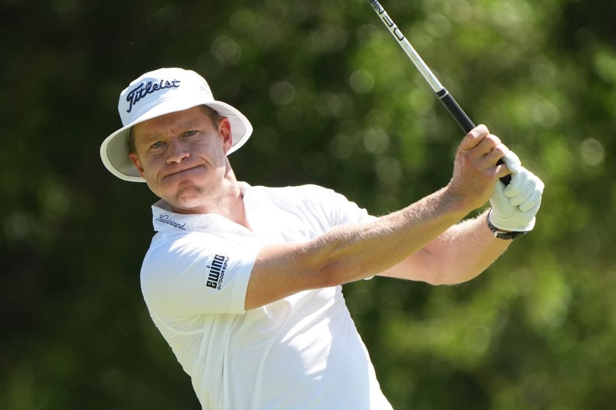 May 23, 2025; Fort Worth, Texas, USA; Peter Malnati watches his shot from the 12th tee during the second round of the Charles Schwab Challenge golf tournament. Mandatory Credit: Jim Cowsert-Imagn Images