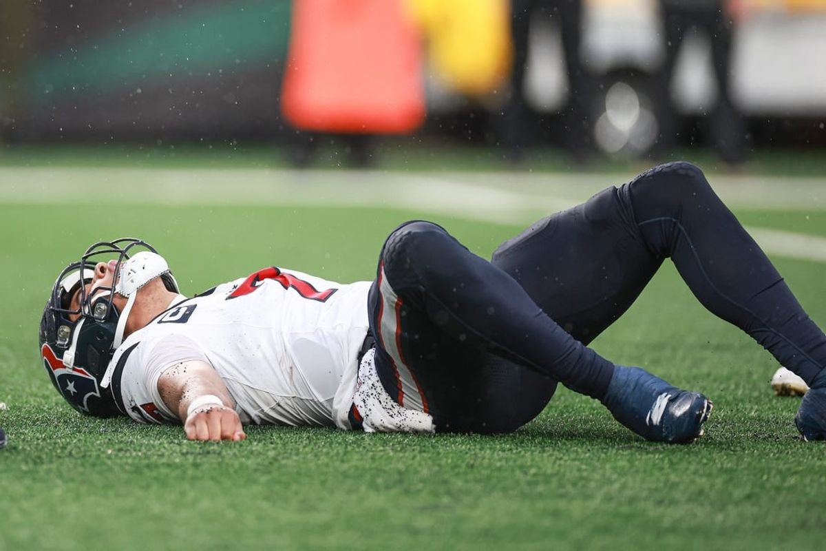 Dec 10, 2023; East Rutherford, New Jersey, USA; Houston Texans quarterback C.J. Stroud (7) on the field after an apparent injury during the second half against the New York Jets at MetLife Stadium.