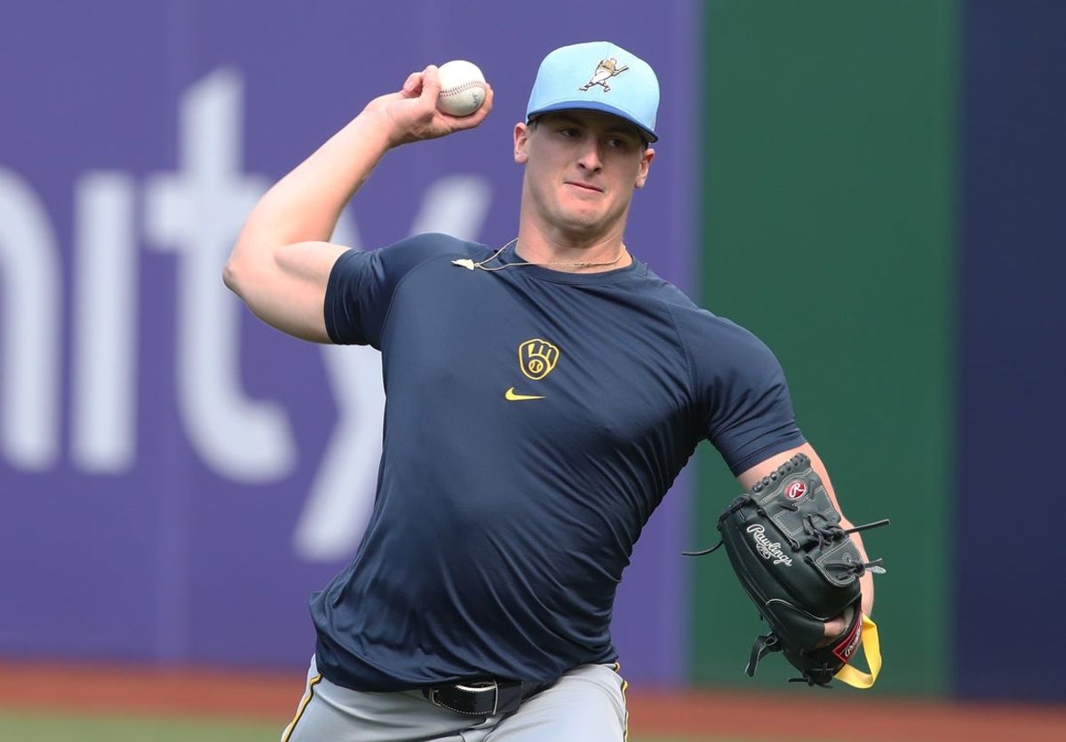 May 23, 2025; Pittsburgh, Pennsylvania, USA;  Milwaukee Brewers pitcher Quinn Priester (46) throws in the outfield before the game the Pittsburgh Pirates against at PNC Park. Mandatory Credit: Charles LeClaire-Imagn Images