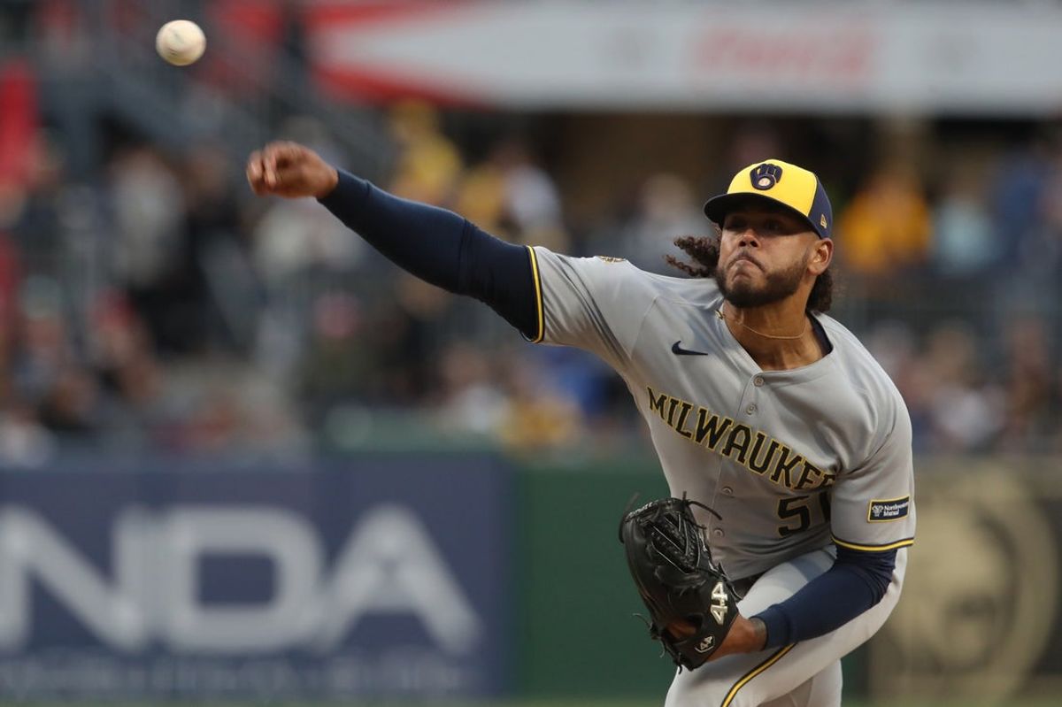 May 23, 2025; Pittsburgh, Pennsylvania, USA;  Milwaukee Brewers starting pitcher Freddy Peralta (51) delivers a pitch against the Pittsburgh Pirates during the first inning at PNC Park. Mandatory Credit: Charles LeClaire-Imagn Images