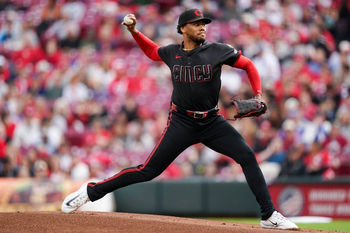 Cincinnati Reds Hunter Greene pitcher (21) throws a pitch in the first inning of the MLB National League game between the Cincinnati Reds and Chicago Cubs, Friday, May 23, 2025, at Great American Ball Park in Downtown Cincinnati.