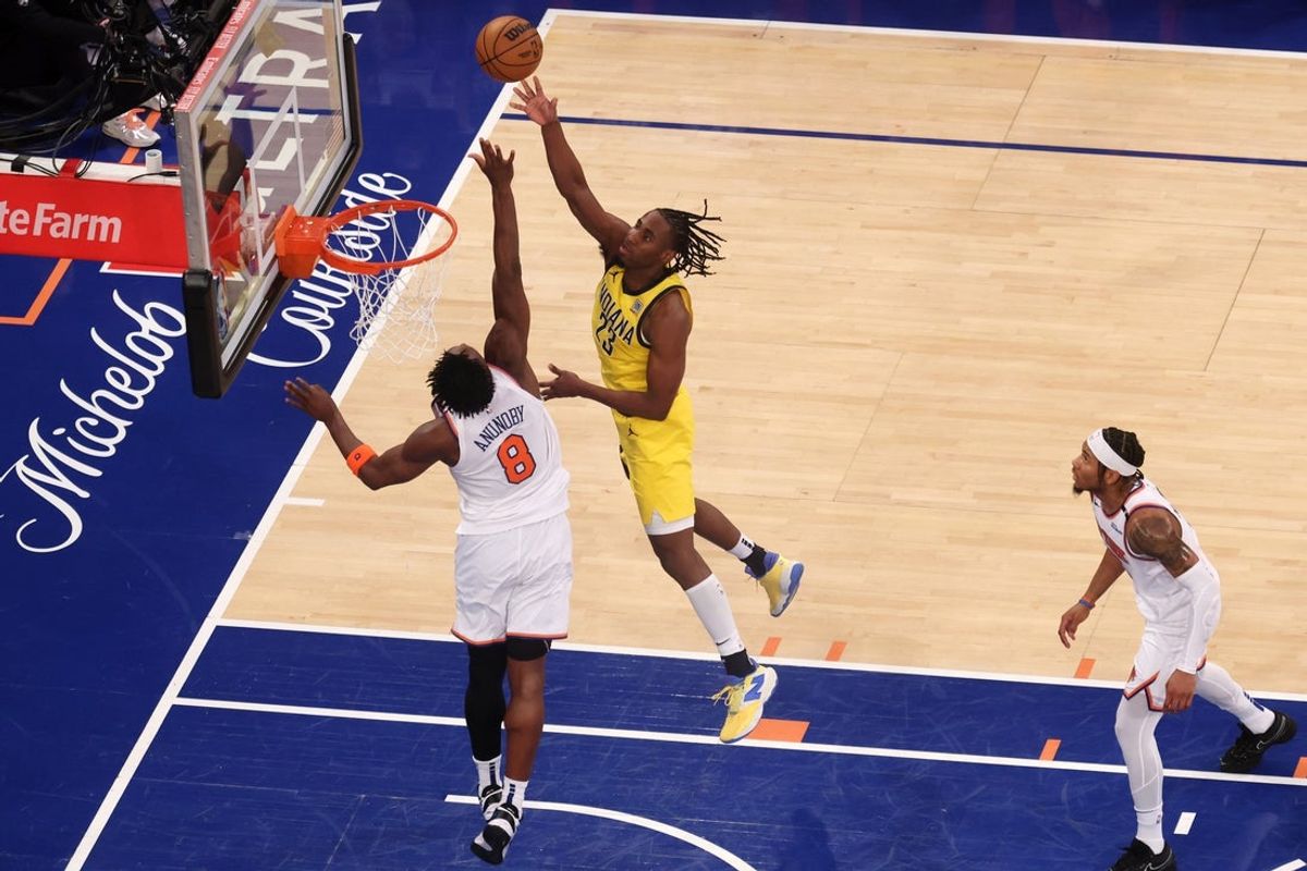 May 23, 2025; New York, New York, USA; Indiana Pacers forward Aaron Nesmith (23) shoots against New York Knicks forward OG Anunoby (8) in the second quarter during game two of the eastern conference finals for the 2025 NBA Playoffs at Madison Square Garden. Mandatory Credit: Vincent Carchietta-Imagn Images