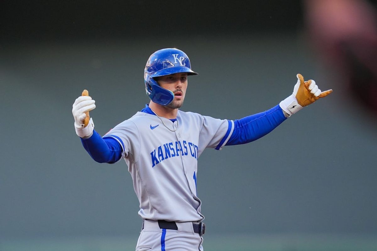 May 23, 2025; Minneapolis, Minnesota, USA; Kansas City Royals designated hitter Cavan Biggio (18) celebrates his double against the Minnesota Twins in the first inning at Target Field. Mandatory Credit: Brad Rempel-Imagn Images