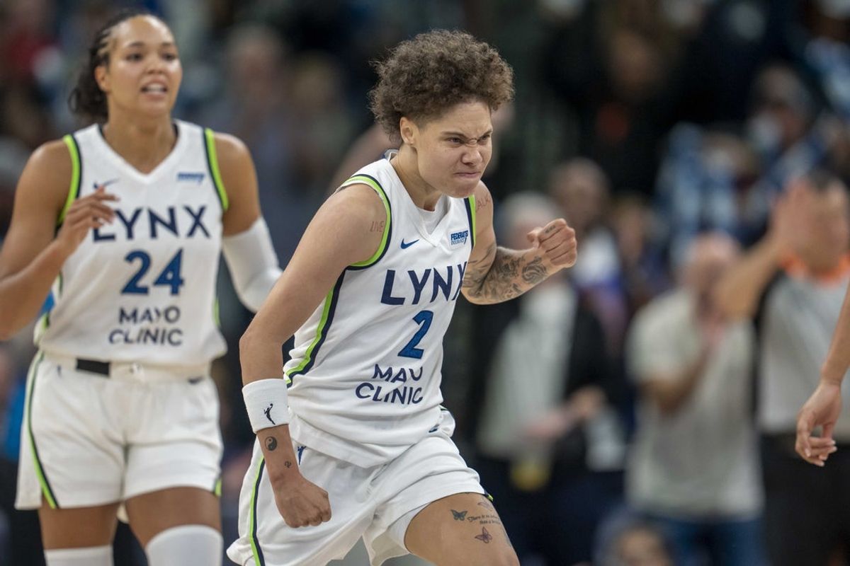 May 23, 2025; Minneapolis, Minnesota, USA; Minnesota Lynx guard Natisha Hiedeman (2) celebrates after making a shot against the Connecticut Sun in the second half  at Target Center. Mandatory Credit: Jesse Johnson-Imagn Images