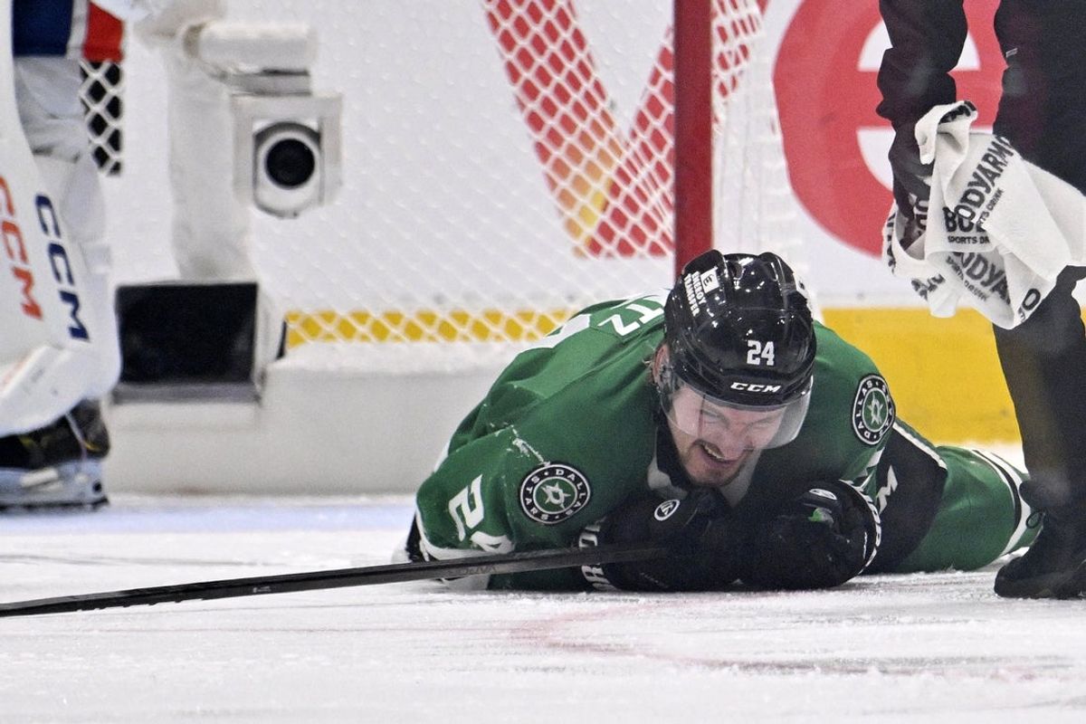 May 23, 2025; Dallas, Texas, USA; Dallas Stars center Roope Hintz (24) reacts after being injured against the Edmonton Oilers in the third period for game two of the Western Conference Final of the 2025 Stanley Cup Playoffs at American Airlines Center. Mandatory Credit: Jerome Miron-Imagn Images