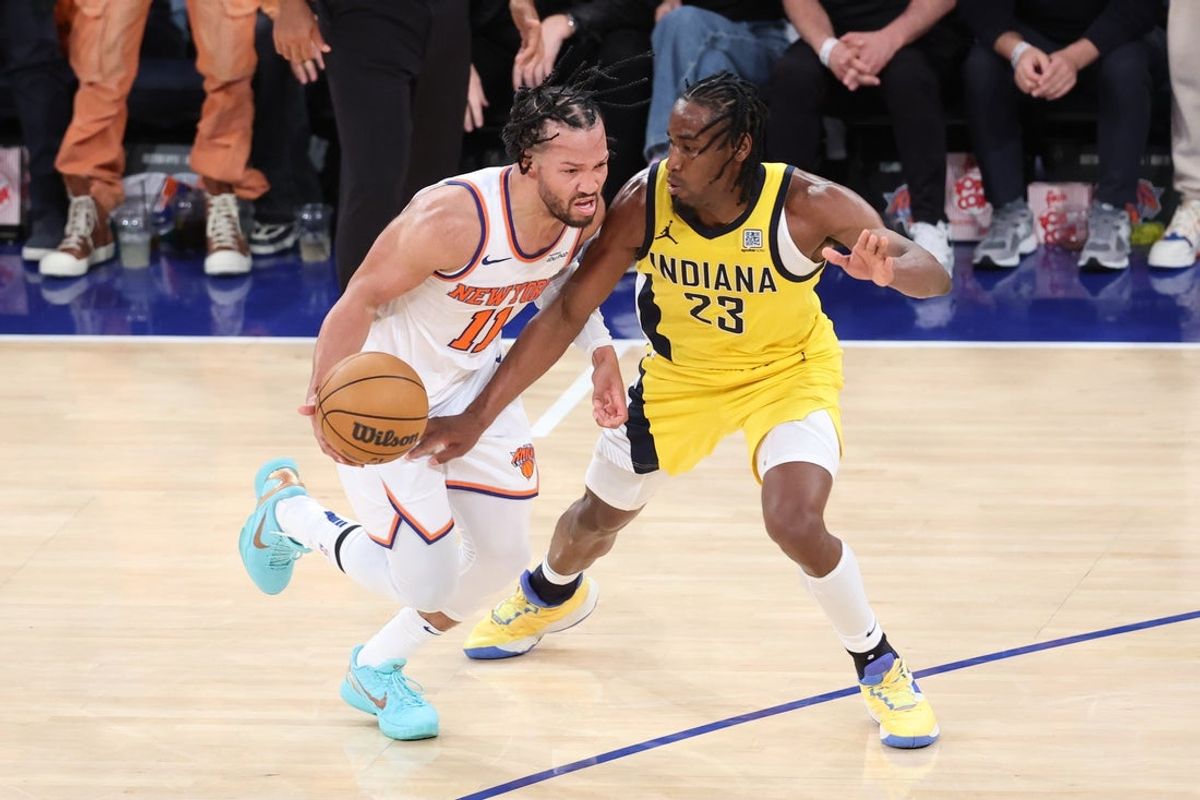 May 23, 2025; New York, New York, USA; New York Knicks guard Jalen Brunson (11) controls the ball against Indiana Pacers forward Aaron Nesmith (23) in the fourth quarter during game two of the eastern conference finals for the 2025 NBA Playoffs at Madison Square Garden. Mandatory Credit: Wendell Cruz-Imagn Images