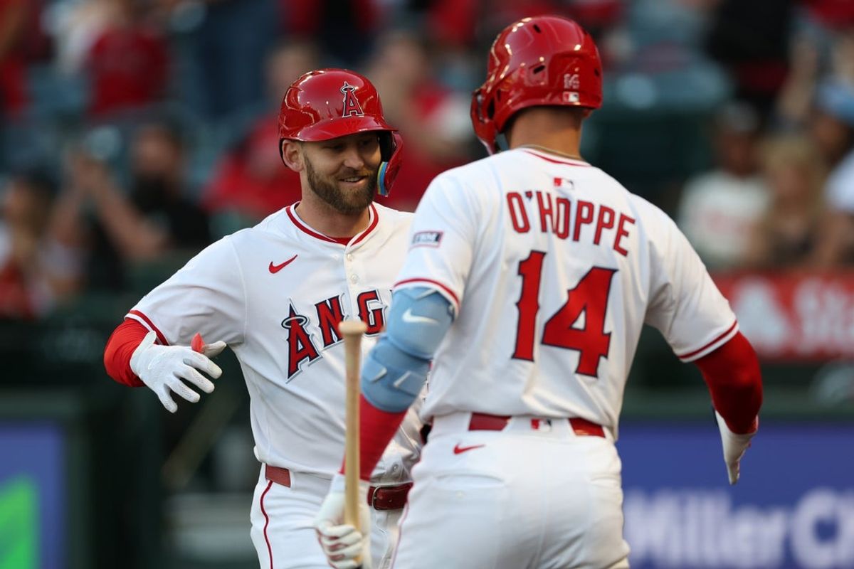 May 23, 2025; Anaheim, California, USA;  Los Angeles Angels left fielder Taylor Ward (3, left) celebrates with designated hitter Logan O'Hoppe (14) after hitting a home run during the second inning against the Miami Marlins at Angel Stadium. Mandatory Credit: Kiyoshi Mio-Imagn Images