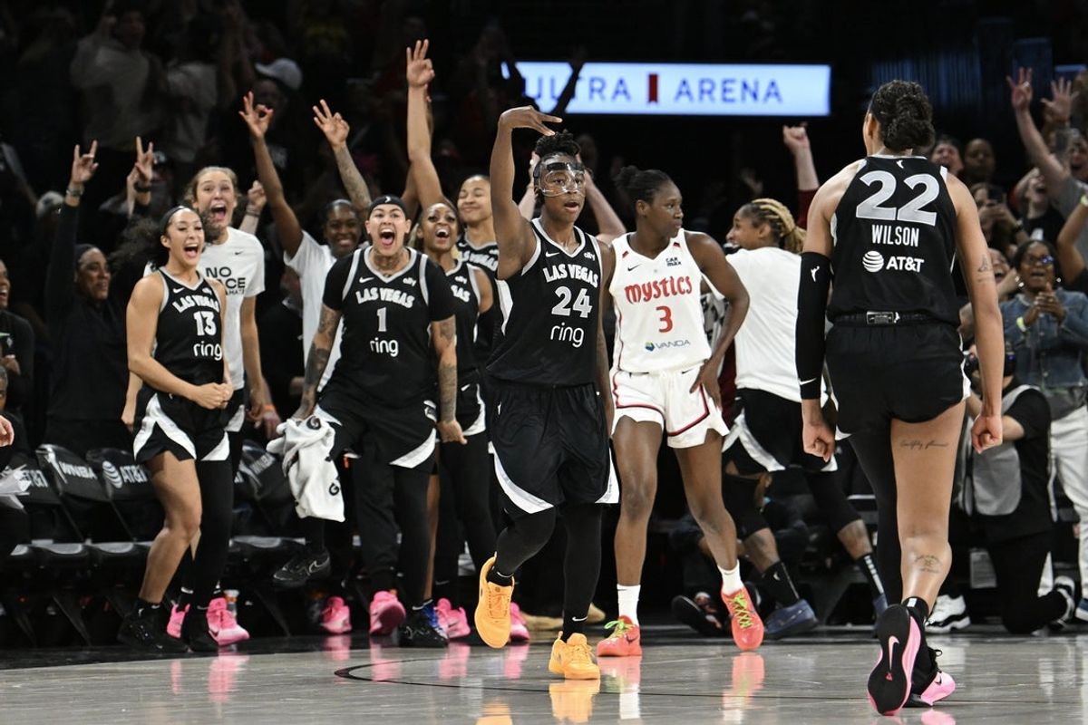May 23, 2025; Las Vegas, Nevada, USA; Las Vegas Aces guard Jewell Loyd (24) celebrates hitting a game-winning three-point basket against the Washington Mystics in the fourth quarter of their game at Michelob Ultra Arena. Mandatory Credit: Candice Ward-Imagn Images