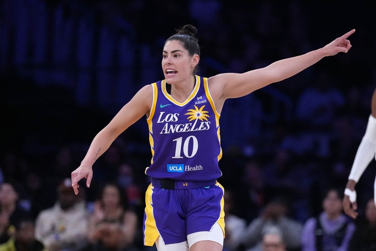 May 23, 2025; Los Angeles, California, USA; LA Sparks guard Kelsey Plum (10) reacts against the Golden State Valkyries in the first half at Crypto.com Arena. Mandatory Credit: Kirby Lee-Imagn Images