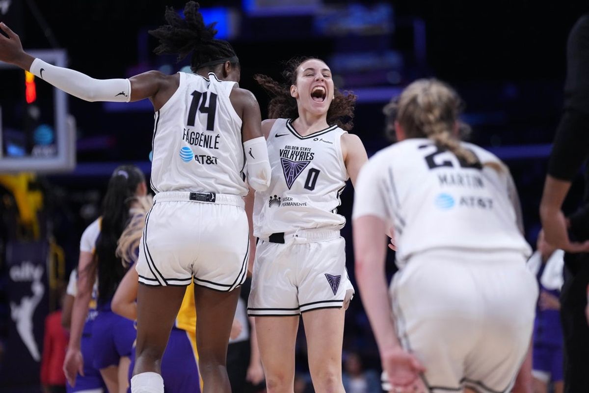 May 23, 2025; Los Angeles, California, USA; Golden State Valkyries center Temi Fagbenle (14) and guard Carla Leite (0) celebrate in the second half against the LA Sparks at Crypto.com Arena. Mandatory Credit: Kirby Lee-Imagn Images