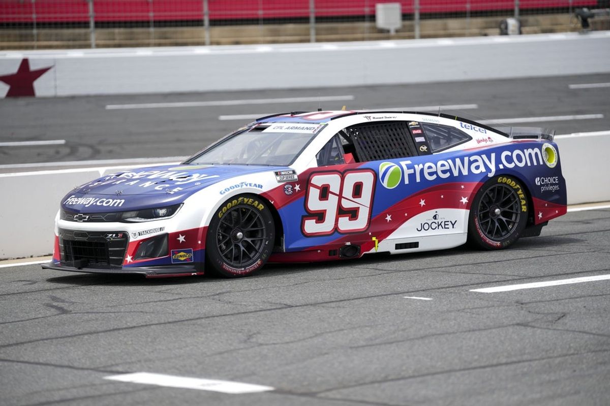 May 24, 2025; Concord, North Carolina, USA;  NASCAR Cup Series driver Daniel Suarez (99) during qualifying at Charlotte Motor Speedway. Mandatory Credit: Jim Dedmon-Imagn Images