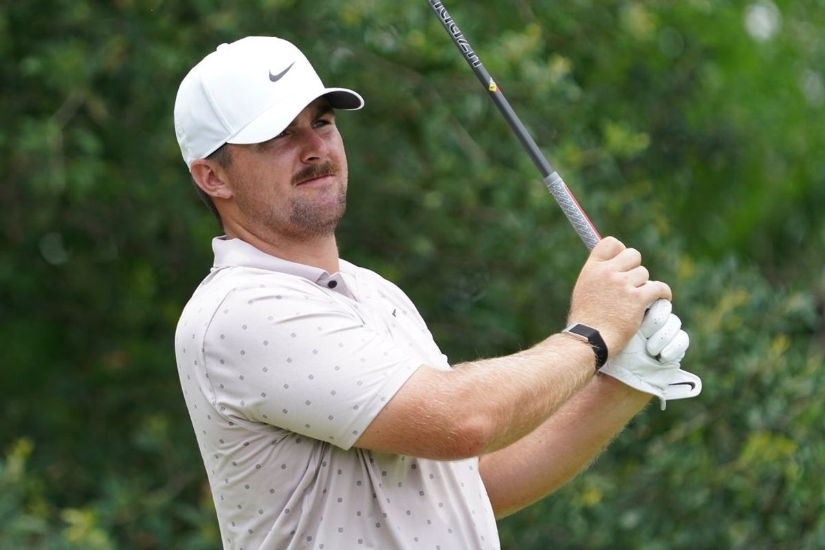 May 24, 2025; Fort Worth, Texas, USA; Chris Gotterup watches his shot from the ninth tee during the third round of the Charles Schwab Challenge golf tournament. Mandatory Credit: Raymond Carlin III-Imagn Images