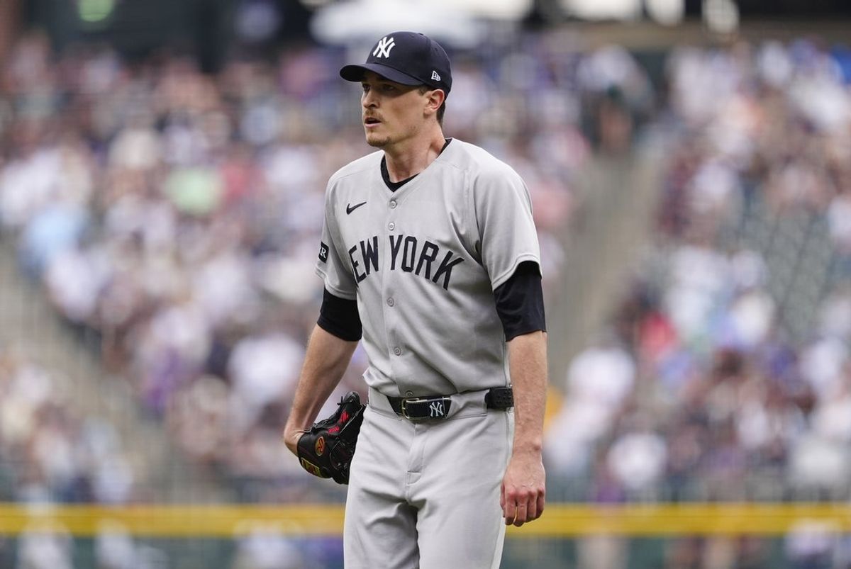 May 24, 2025; Denver, Colorado, USA; New York Yankees starting pitcher Max Fried (54) in the first inning against the Colorado Rockies at Coors Field. Mandatory Credit: Ron Chenoy-Imagn Images