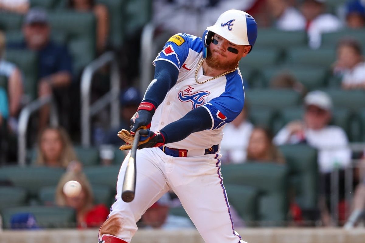 May 24, 2025; Atlanta, Georgia, USA; Atlanta Braves left fielder Alex Verdugo (8) hits a single against the San Diego Padres in the seventh inning at Truist Park. Mandatory Credit: Brett Davis-Imagn Images