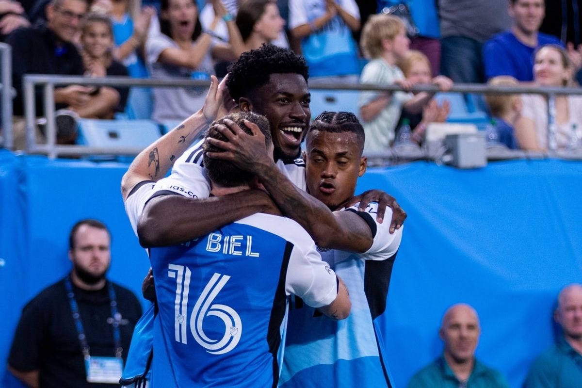 May 24, 2025; Charlotte, North Carolina, USA; Charlotte FC forward Patrick Agyemang (33) celebrates after scoring against the Columbus Crew during the first half at Bank of America Stadium. Mandatory Credit: Scott Kinser-Imagn Images
