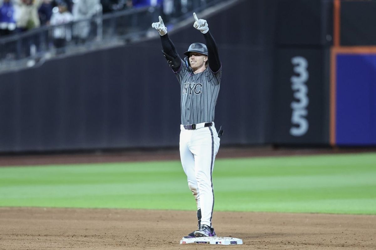 May 24, 2025; New York City, New York, USA;  New York Mets third baseman Brett Baty (7) gestures after hitting an RBI double in the eighth inning against the Los Angeles Dodgers at Citi Field. Mandatory Credit: Wendell Cruz-Imagn Images