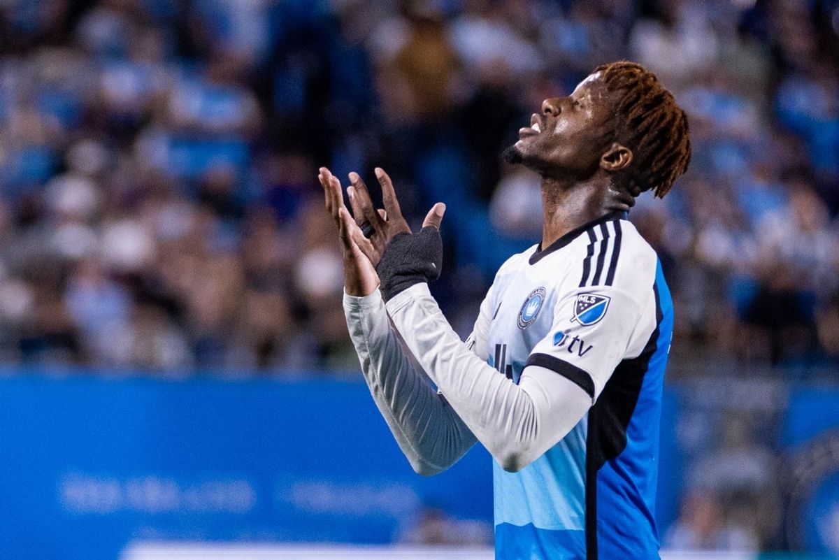 May 24, 2025; Charlotte, North Carolina, USA; Charlotte FC forward Wilfried Zaha (10) prays during the second half against the Columbus Crew at Bank of America Stadium. Mandatory Credit: Scott Kinser-Imagn Images
