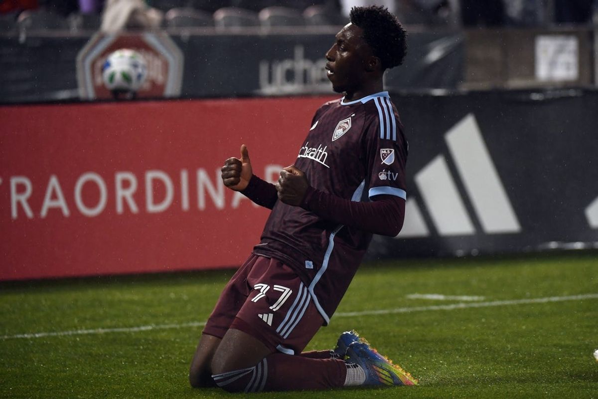 May 24, 2025; Commerce City, Colorado, USA; Colorado Rapids forward Darren Yapi (77) celebrates after a goal during the first half against the St. Louis City at Dick's Sporting Goods Park. Mandatory Credit: Christopher Hanewinckel-Imagn Images