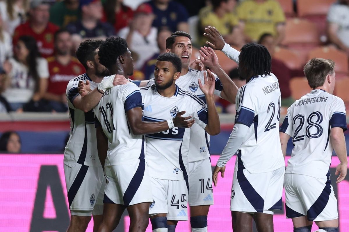 May 24, 2025; Sandy, Utah, USA; The Vancouver Whitecaps celebrate a go ahead goal by midfielder Pedro Vite (45) against Real Salt Lake during the second half at America First Field. Mandatory Credit: Rob Gray-Imagn Images
