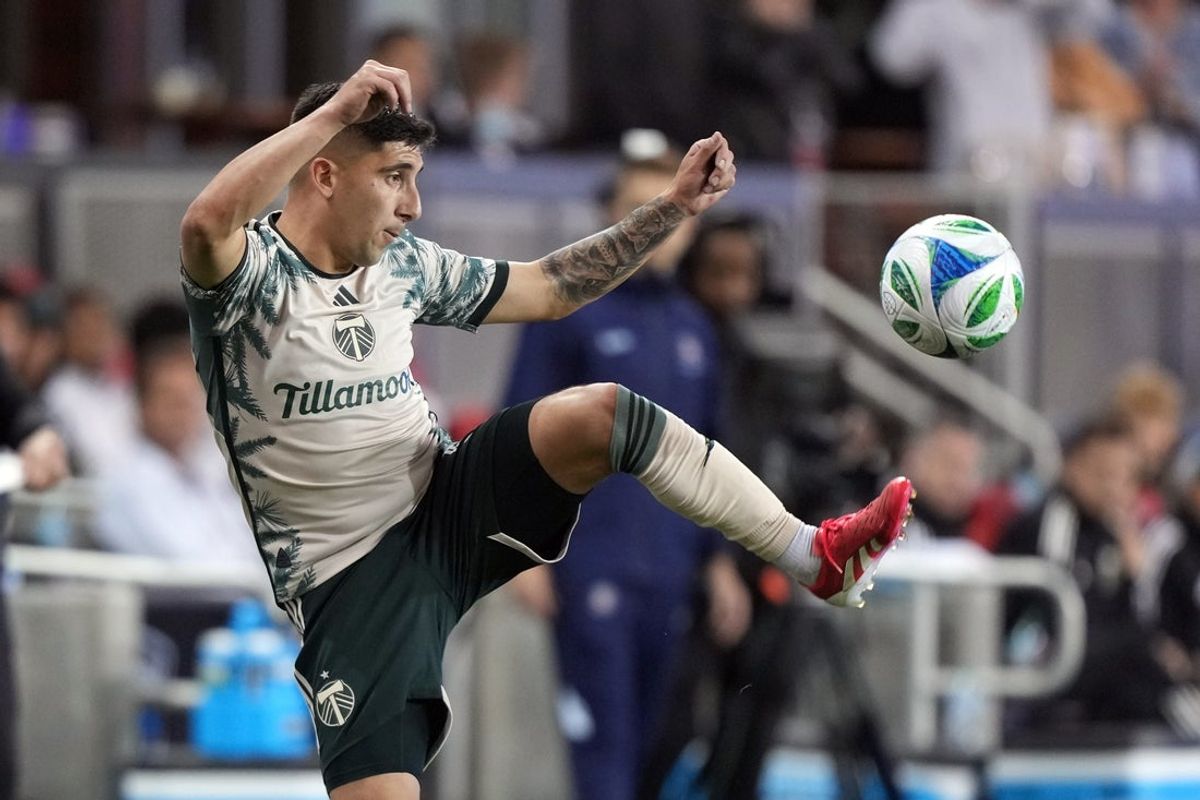 May 20, 2025; San Jose, California, USA; Portland Timbers defender Claudio Bravo (5) reaches for the ball during extra time against the San Jose Earthquakes at PayPal Park. Mandatory Credit: Darren Yamashita-Imagn Images