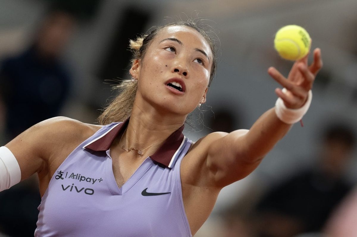 May 25, 2025; Paris, FR;  Qinwen Zheng  of China tosses the ball to serve during her match against Anastasia Pavlyuchenkova on day one at Roland Garros Stadium. Mandatory Credit: Susan Mullane-Imagn Images