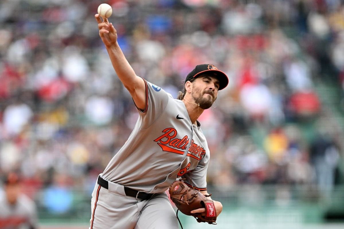 May 25, 2025; Boston, Massachusetts, USA; Baltimore Orioles starting pitcher Dean Kremer (64) pitches against the Boston Red Sox during the first inning at Fenway Park. Mandatory Credit: Brian Fluharty-Imagn Images