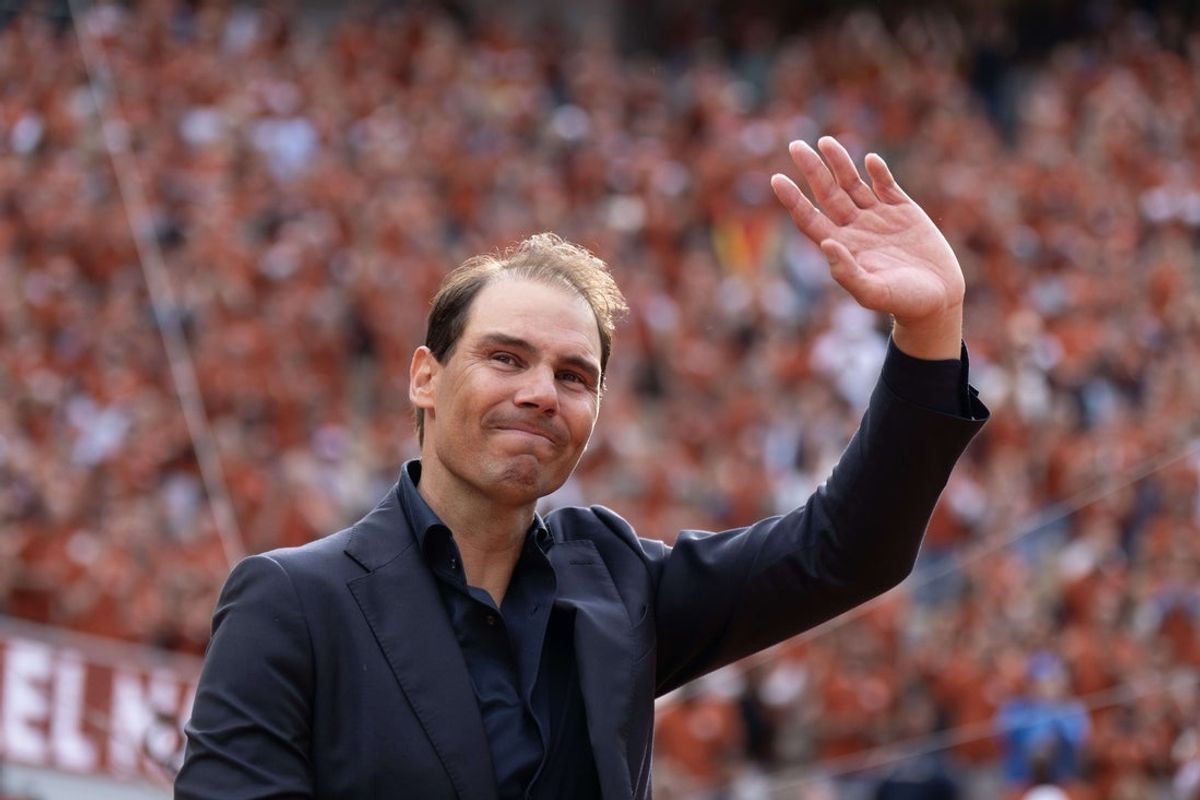 May 25, 2025; Paris, FR; Rafael Nadal of Spain does a final walk around the court during the presentation ceremony paying tribute to his career on a packed Court Philippe Chatrier Courtday on day one at Roland Garros Stadium. Mandatory Credit: Susan Mullane-Imagn Images