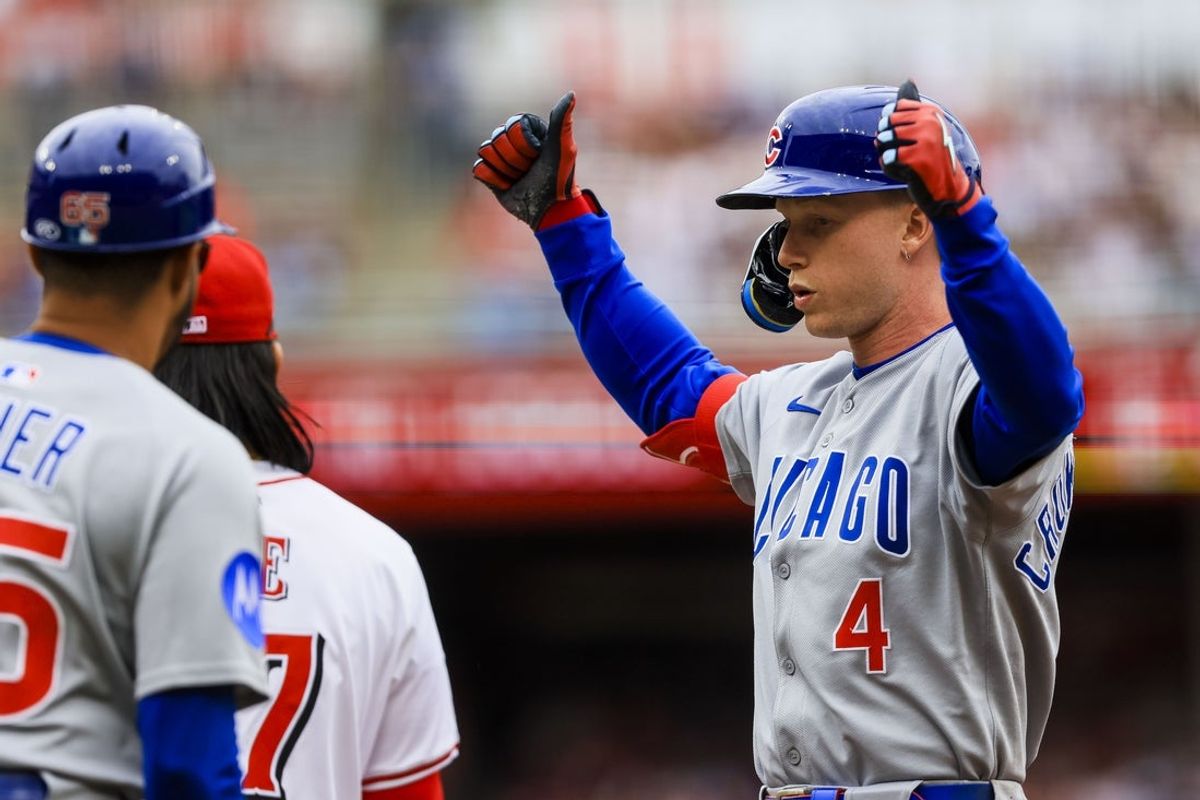 May 25, 2025; Cincinnati, Ohio, USA; Chicago Cubs outfielder Pete Crow-Armstrong (4) reacts after hitting a two-run single in the first inning against the Cincinnati Reds at Great American Ball Park. Mandatory Credit: Katie Stratman-Imagn Images