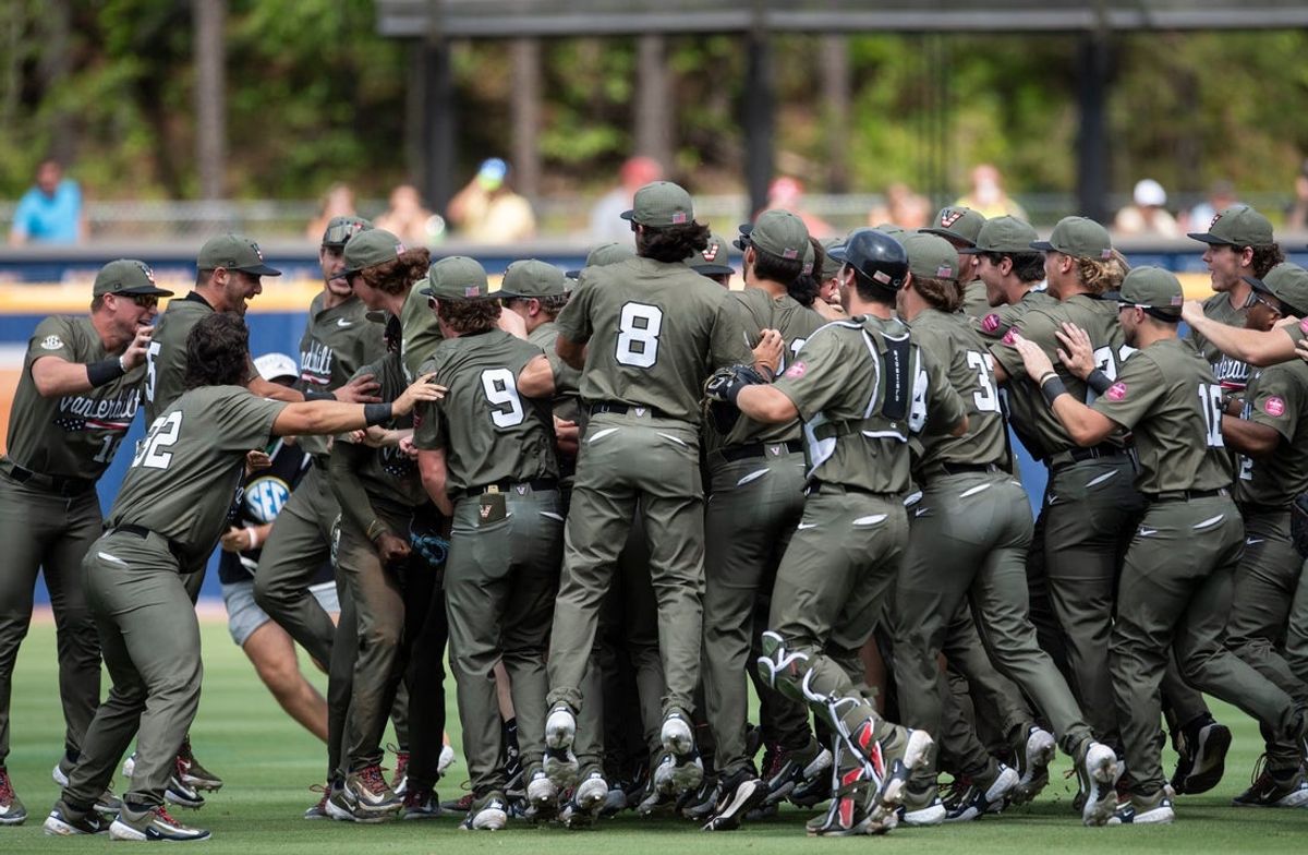 Vanderbilt Commodores players celebrate victory as Ole Miss Rebels take on Vanderbilt Commodores during the SEC baseball tournament championship game at Hoover Met in Birmingham, Ala., on Sunday, May 25, 2025. Vanderbilt Commodores defeated Ole Miss Rebels 3-2.