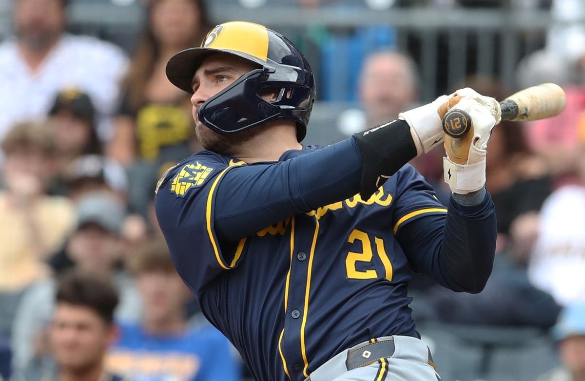 May 25, 2025; Pittsburgh, Pennsylvania, USA;  Milwaukee Brewers third baseman Caleb Durbin (21) hits a two run double against the Pittsburgh Pirates during the eighth inning at PNC Park. Mandatory Credit: Charles LeClaire-Imagn Images