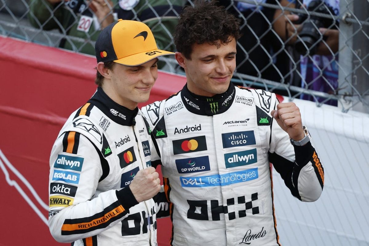 McLaren's Lando Norris celebrates after winning the Monaco Grand Prix alongside third place McLaren's Oscar Piastri at Circuit de Monaco. Mandatory Credit: Stephanie Lecocq/Reuters via Imagn Images