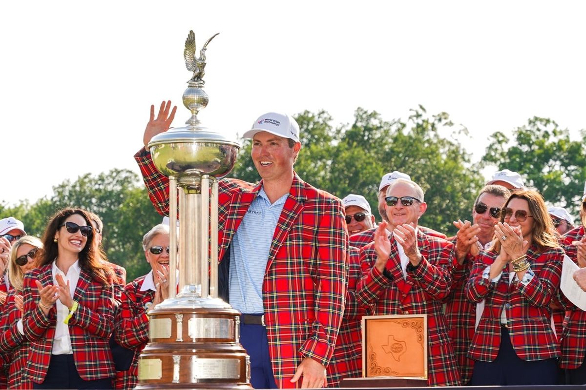 May 25, 2025; Fort Worth, Texas, USA; Ben Griffin is awarded the Colonial Country Club Tartan Jacket after winning the Charles Schwab Challenge golf tournament. Mandatory Credit: Raymond Carlin III-Imagn Images