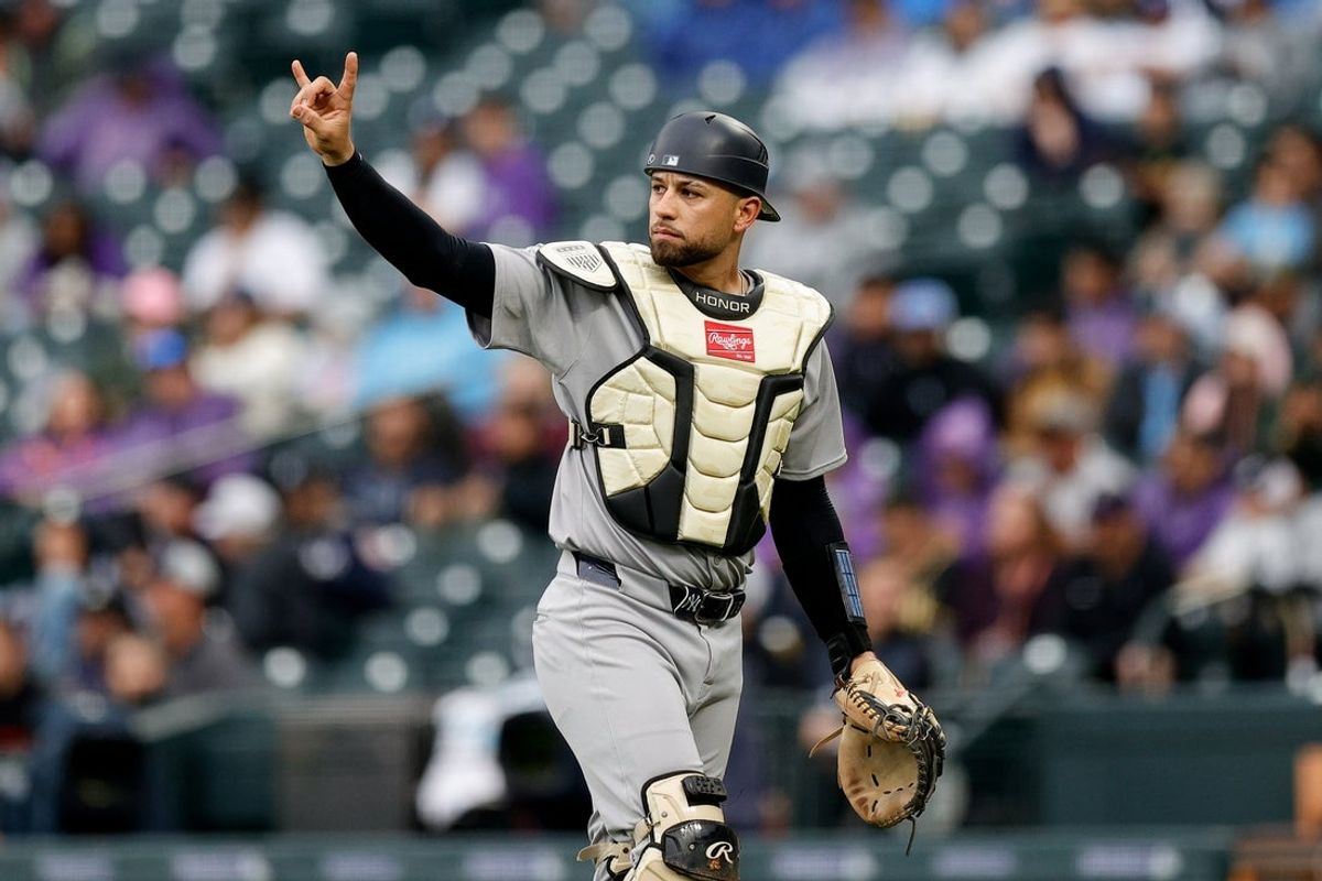 May 25, 2025; Denver, Colorado, USA; New York Yankees catcher J.C. Escarra (25) gestures in the sixth inning against the Colorado Rockies at Coors Field. Mandatory Credit: Isaiah J. Downing-Imagn Images