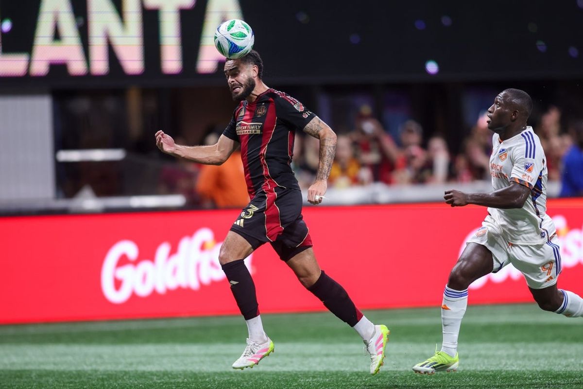May 25, 2025; Atlanta, Georgia, USA; Atlanta United defender Derrick Williams (3) heads the ball against FC Cincinnati in the first half at Mercedes-Benz Stadium. Mandatory Credit: Brett Davis-Imagn Images
