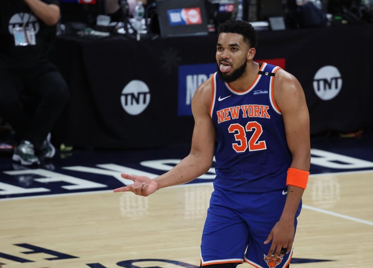 May 25, 2025; Indianapolis, Indiana, USA; New York Knicks center Karl-Anthony Towns (32) reacts during the fourth quarter against the Indiana Pacers during game three of the eastern conference finals for the 2025 NBA Playoffs at Gainbridge Fieldhouse. Mandatory Credit: Trevor Ruszkowski-Imagn Images