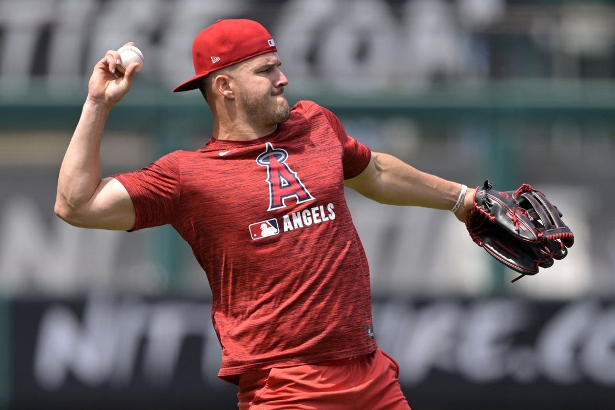 May 26, 2025; Anaheim, California, USA;  Los Angeles Angels right fielder Mike Trout (27) works out on the field prior to the game against the New York Yankees at Angel Stadium. Mandatory Credit: Jayne Kamin-Oncea-Imagn Images