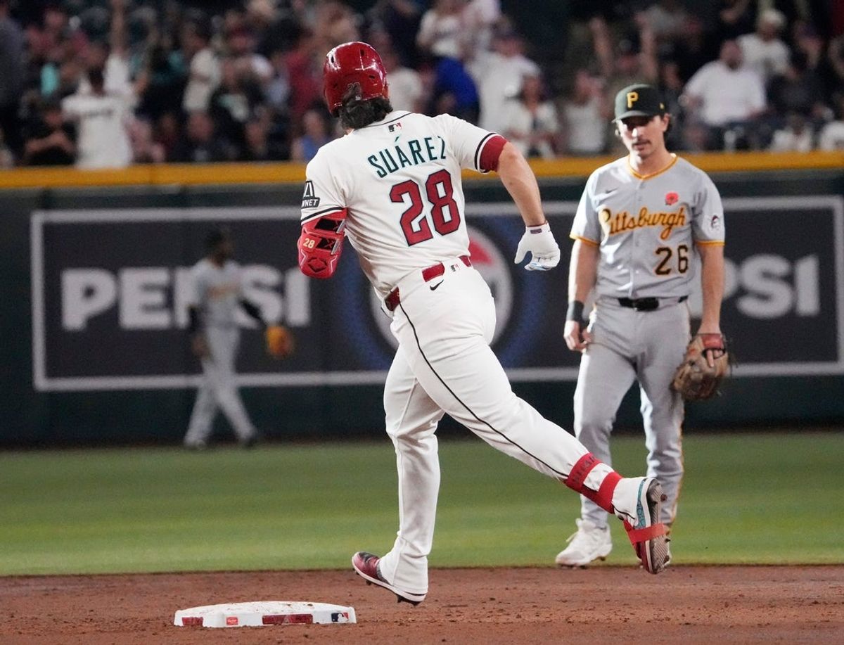Arizona Diamondbacks’ Eugenio Suarez (28) rounds the bases after a solo home run against the Pittsburgh Pirates during the third inning at Chase Field May 26, 2025.