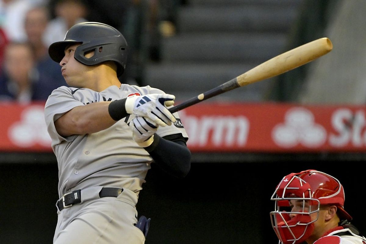 May 26, 2025; Anaheim, California, USA;  New York Yankees shortstop Anthony Volpe (11) doubles in three runs in the fourth inning against the Los Angeles Angels at Angel Stadium. Mandatory Credit: Jayne Kamin-Oncea-Imagn Images