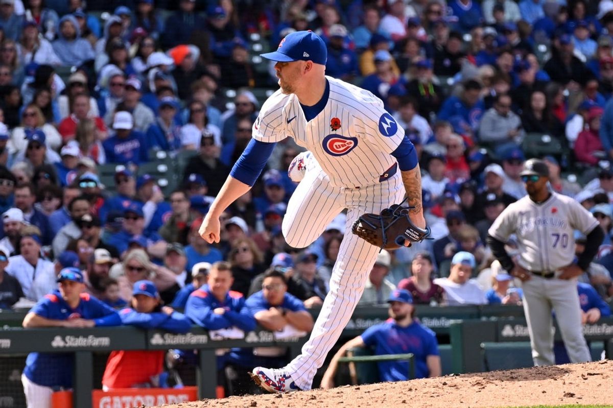May 26, 2025; Chicago, Illinois, USA; Chicago Cubs relief pitcher Ryan Pressly (55) pitches during a game against the Colorado Rockies at Wrigley Field. Mandatory Credit: Patrick Gorski-Imagn Images